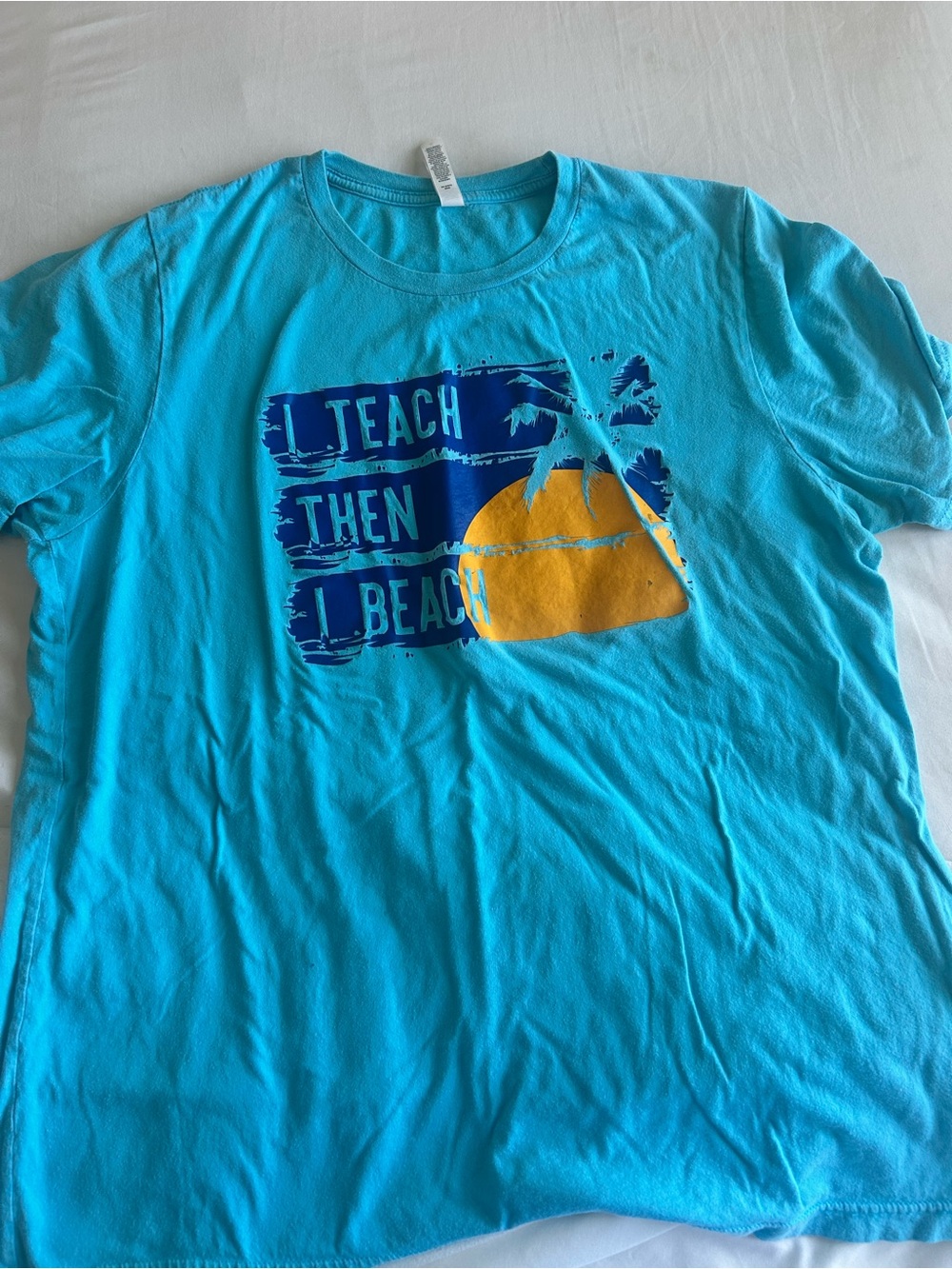 Bella Canvas Turquoise Tee with Navy and Yellow Graphic